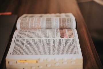 old book on wooden table bible