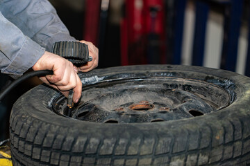 used tire mounting and inflating closeup