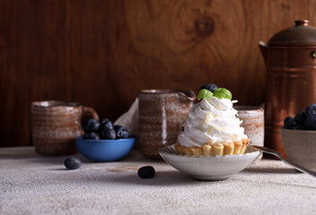 mini cake basket with meringue cream