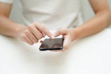 Teenage using smart phone for communication, search data internet website to learn.