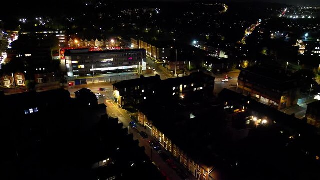 High Angle Time Lapse Footage of Illuminated Roads and Residential District of Central Luton Town of England During Night. The Footage Captured with Drone's Camera on November 4th, 2023