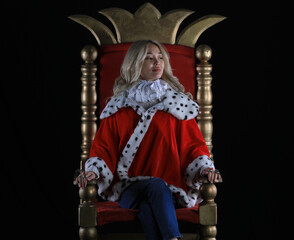 beautiful blonde queen on the throne