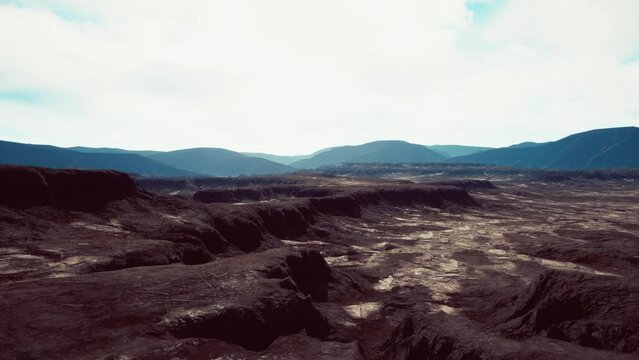 black volcanic basalt rock formations in the low light