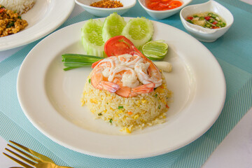 Shrimp fried rice on a rice plate