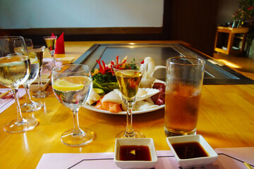 chef's hands with spatula over teppanyaki. Teppan show