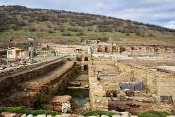 Archeological site in a valley on a cloudy day