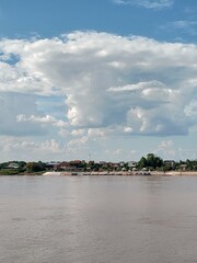 Fototapeta premium clouds over the river