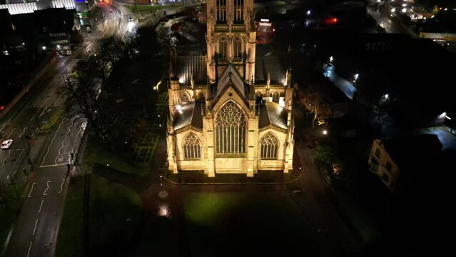 Aerial of the illuminated Doncaster Minster church in England during the nighttime