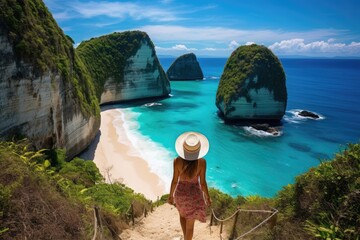 Woman with hat on the island of Phi Phi, Krabi, Thailand, rear view of a Woman walking at Kelingking Beach in Nusa penida island, Bali, Indonesia, AI Generated - obrazy, fototapety, plakaty