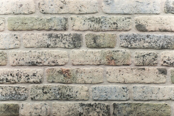 Fototapeta premium Stone wall background, Exterior gray color old brick Wall, brick wall texture background. Old vintage brick wall pattern
