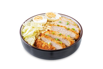 Ramen noodles with meat schnitzel slices, peking cabbage, eggs and scallions on a white isolated background