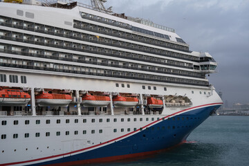 Modern cruiseship or cruise ship liner Freedom arrival into  port of Barcelona Espana, Spain...