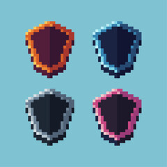  Pixel art sets of shield with variation color item asset.Gold Shield on pixelated style. 8bits perfect for game asset or design asset element for your game design asset