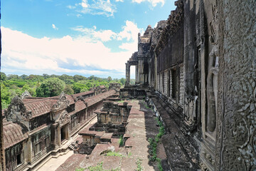 A view of the main gallery and quadrangle of the Angkor Wat temple complex from the top of the...