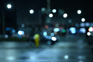 city ​​night lights cars defocused background