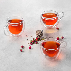 flower tea in a glass cups. On a white background. Tea concept.