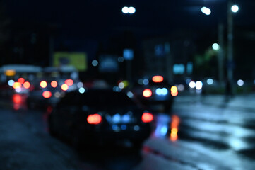 city ​​night lights cars defocused background