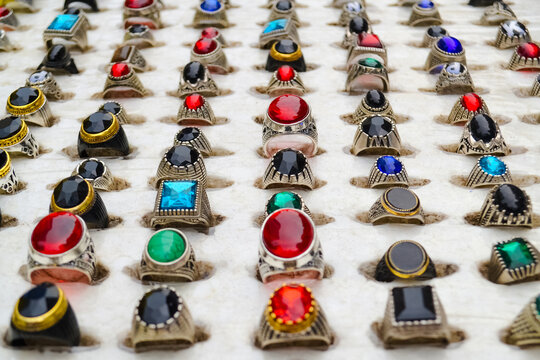 Gemstone rings for womens and mens fashion. Vibrant colored stones are set in metal rings