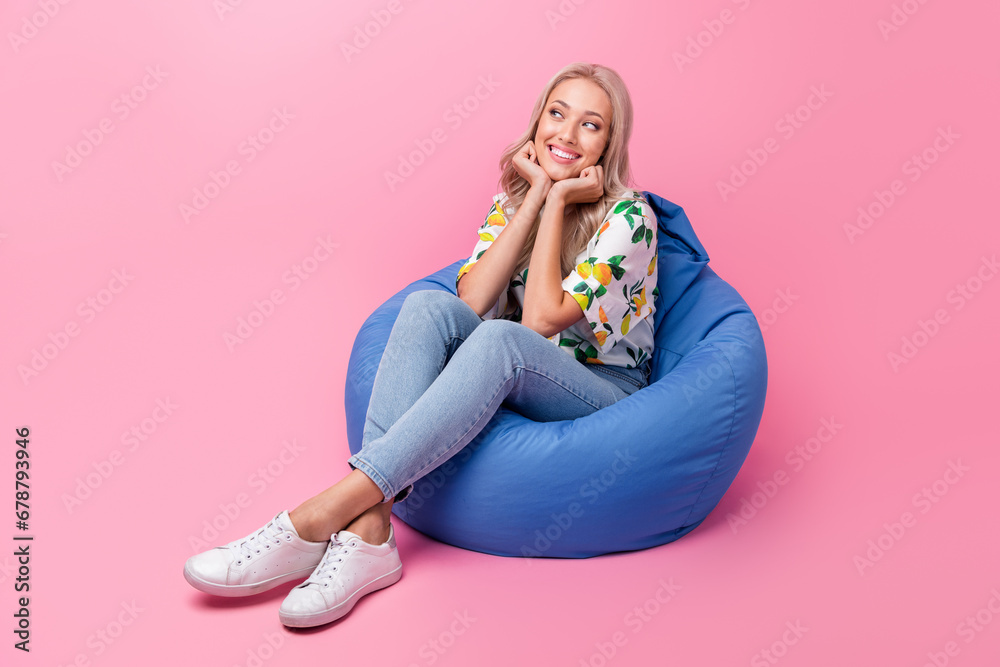 Sticker Full length body photo of charming lady relax parents garden hands cheeks lying pouf dreamy look novelty isolated on pink color background