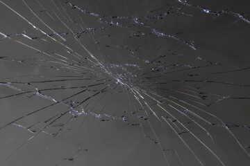 damaged LCD screen with cracks, full-frame background