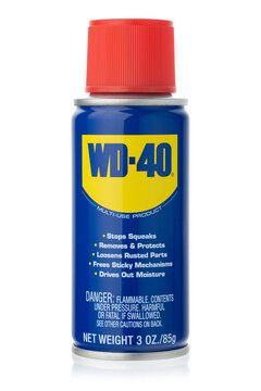 Dnipro, Ukraine -04.11.2023: WD-40 Product for multi purpose use for rusty item. WD-40 Multi-Use Product Spray isolated on white.	

