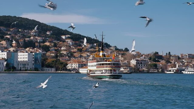 Ferry boat on background of coastline of Island Burgazada in the Sea of Marmara