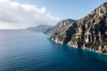 Fototapeta na wymiar Positano, Italy. Rugged Mountains of the Amalfi Coast. Aerial Drone Photo