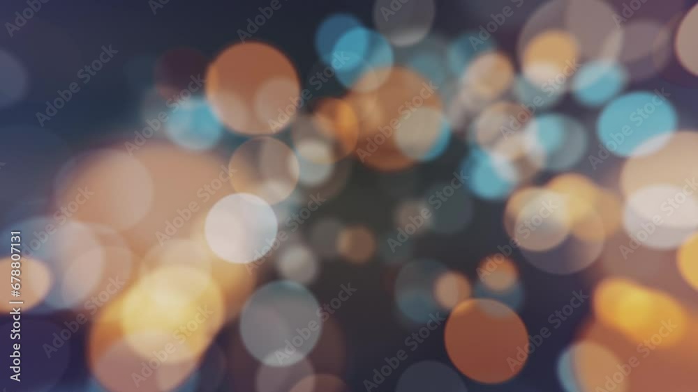 Wall mural abstract bokeh background animation with gently flickering defocused warm blue and amber light spher