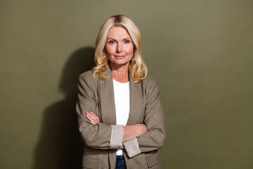 Portrait photo of confident entrepreneur with big knowledge folded hands lady waiting conference isolated on khaki color background