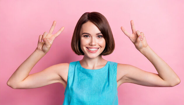 closeup photo of young funky playful lady bob brown hair wear blue trendy top hands gesture hands rabbit isolated on pink color background