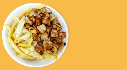 Loin portion, fries and onion in polystyrene packed lunch very common in Brazil known as marmitex (marmita) (packed lunch). Copy space for design.