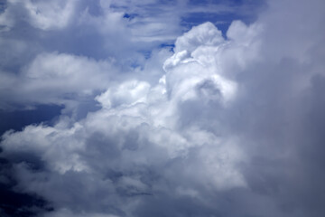 Blue sky and puffy clouds over the Atlantic Ocean in the South America area