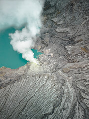 Java's Volcanic Gem: Aerial View of Mount Ijen and the World's Largest Highly Acidic Lake. Embark on a Natural Adventure in Indonesia, Asia's Premier Vacation Destination