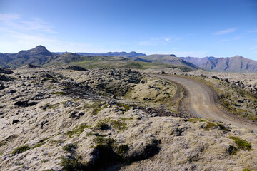 A view of the dirt road among the lava fields. Helgafellssveit, Iceland.