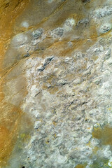 Hverir, Iceland. A surreal, bare orangy-red, geothermal area at the foot of Namafjall. Full of fumaroles, mud pools, steam vents. It's on Route 1. It is also called Namaskard Hverir.