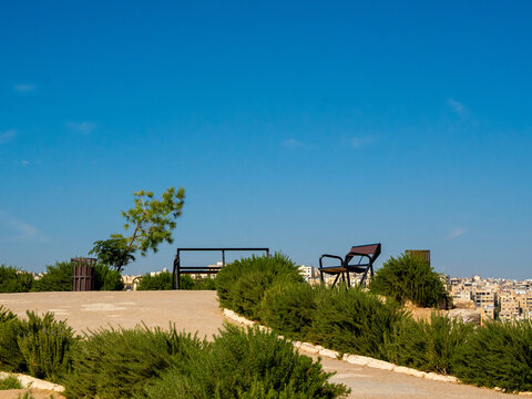 seets on jabal qalaa Amman Jordan Landscape city blue sky