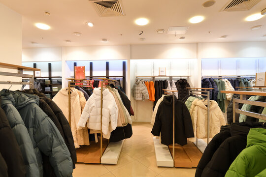 Women's winter down jackets in the store
