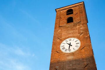 View of the clock tower in Lucca, Tuscany, Italy.