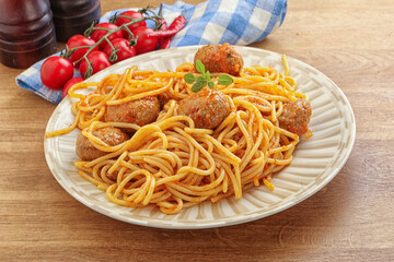 Spaghetti with meatball in tomato sause