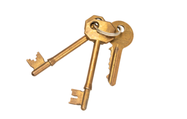 Vintage golden keys isolated on white background