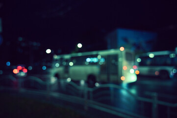 city ​​night lights cars defocused background