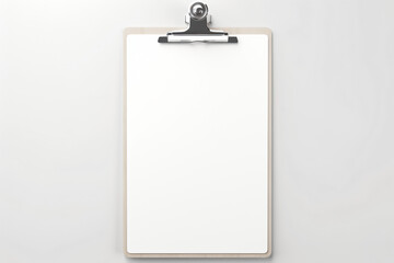 Empty white clipboard with metal clip on plain background