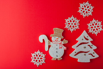 Christmas, snowman with Christmas tree, white snowflakes. Christmas background.