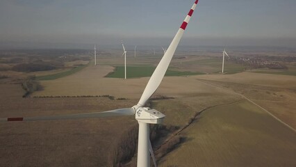 Gyor region, Hungary - april 20, 2018: Wind power station in sunset of drone. Romantic evening and modern technologies of ecologically clean electricity. Protection of the environment. Bright Future.