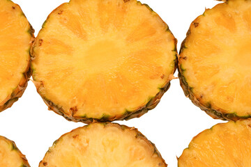 Pineapple juicy yellow slices on a white background.