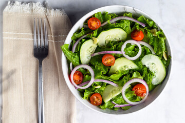  salad bold of tomatoes, onion and , cucumbers