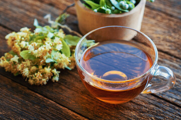 herbal Cup of healthy tea from linden flowers. alternative, complementary traditional medicine...