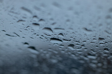 Water raindrops on window glass. Background image.