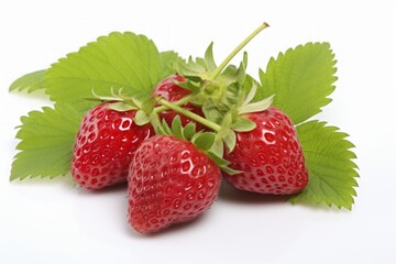 Juicy and vibrant red strawberries with fresh green leaves isolated on a clean white background