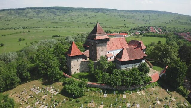 Fortified church and fortress of Viscri in Transylvania, Romania, Europe, Aerial view